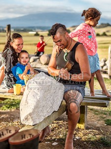 Hikoi Te Riaki at home with his wife Tamzyn, at home with children. Mt Ruapehu, or 'Koro' as his descendants call him, stands prominently in front of their home, Ohakune, Ruapehu (54184QF00)